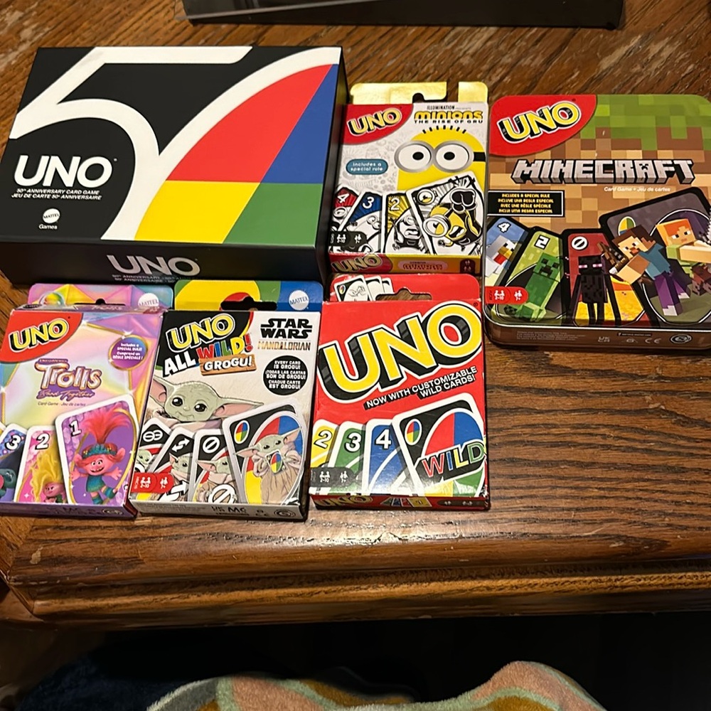 Uno cards the uno 50 edition is brand new never opened all the rest are like new